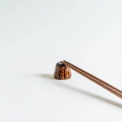 Mogutable Selects Chocolate Canelé Chopstick Rest Hot