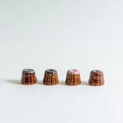 Mogutable Selects Chocolate Canelé Chopstick Rest Hot